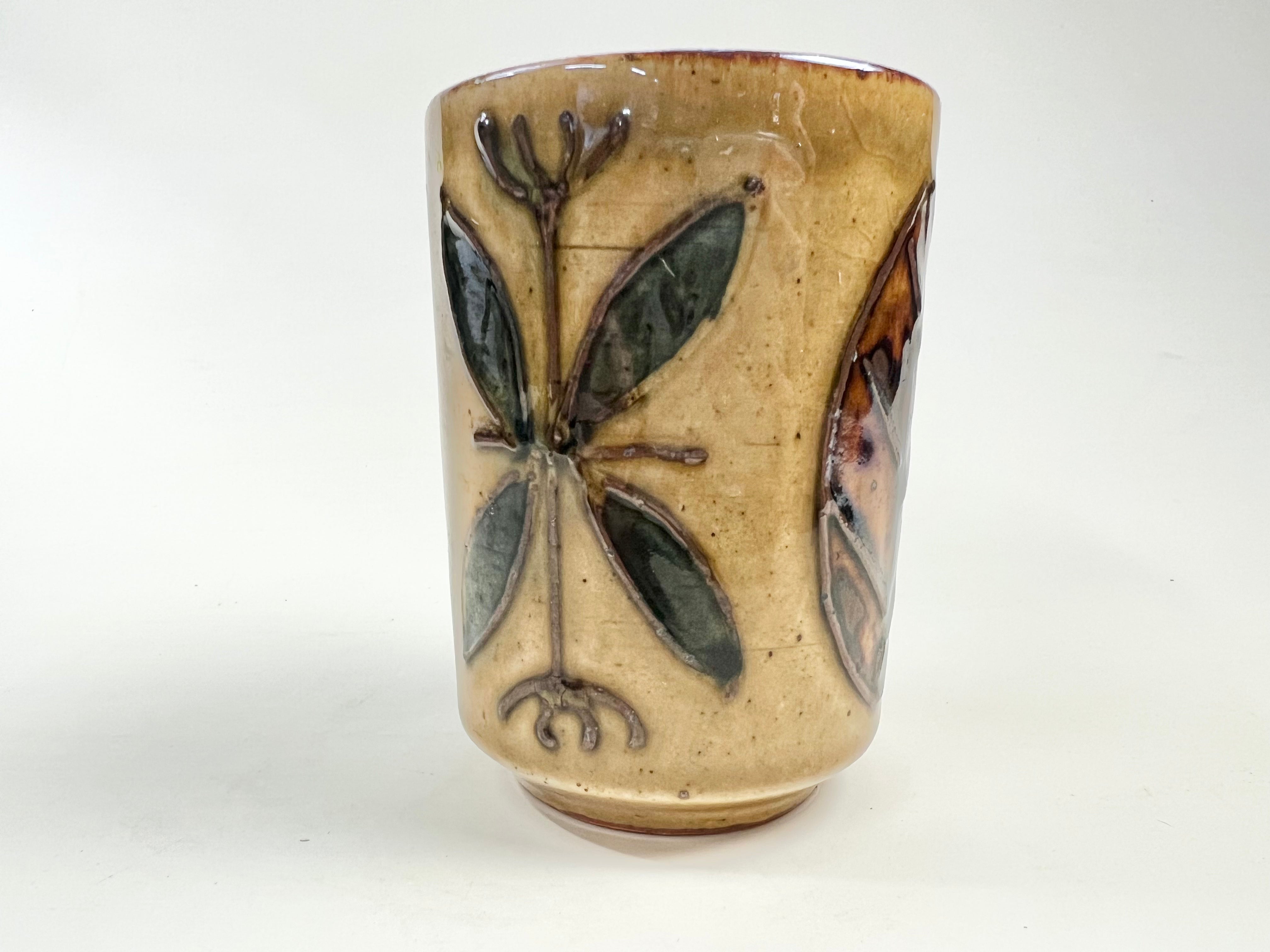 Small Glazed Pottery Vessel with Leaves Design